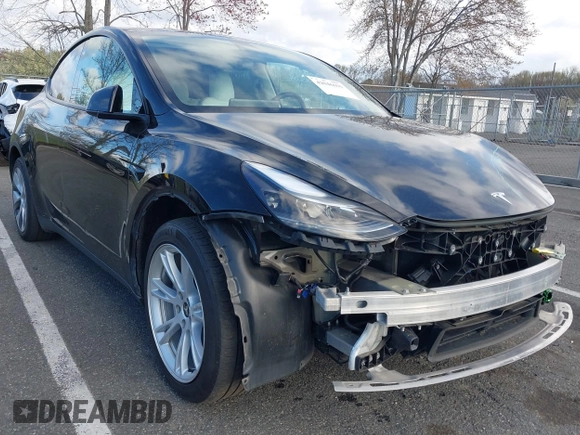 2022 Tesla Model Y Long Range with VIN 7SAYGAEE4NF522330, listed as a IAAI auction lot 42046691 with 59,980 mi miles and . Bid and sale history available at carsss.com. Image 1.