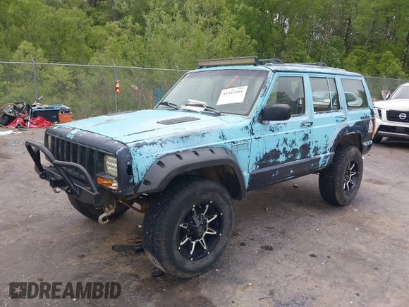 1997 Jeep Cherokee SE z VIN 1J4FJ28S3VL573144, wystawiony jako IAAI lot #41965201 z przebiegiem 298 276 mil mil oraz . Historia ofert i sprzedaży dostępna na DreamBid. Obrazek 21.