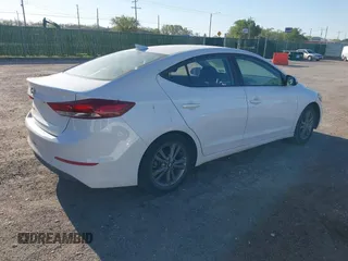 2018 Hyundai Elantra SEL with VIN 5NPD84LF5JH267673, listed as a IAAI auction lot 41907765 with 98,529 mi miles and . Bid and sale history available at DreamBid. Image 4.