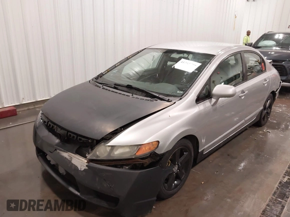 2009 Honda Civic LX z VIN 2HGFA16559H320179, wystawiony jako IAAI lot #41793459 z przebiegiem 172 878 mil mil oraz . Historia ofert i sprzedaży dostępna na DreamBid. Obrazek 6.