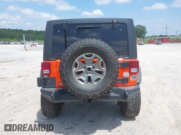 2015 Jeep Wrangler Unlimited Rubicon z VIN 1C4BJWFG4FL598033, wystawiony jako IAAI lot #42435523 z przebiegiem 134 202 mil mil oraz . Historia ofert i sprzedaży dostępna na DreamBid. Obrazek 16.