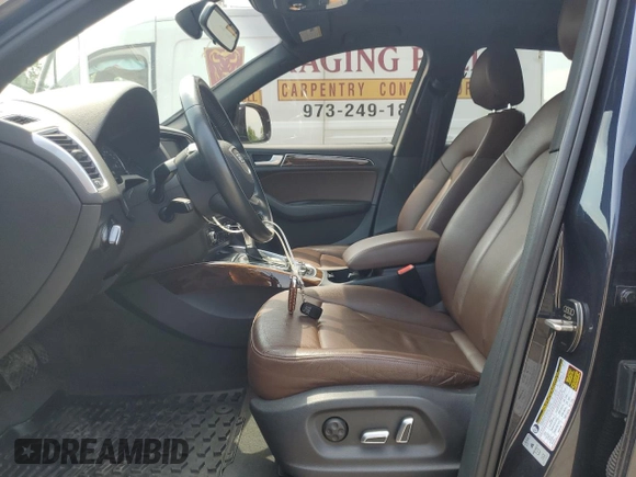 2017 Audi Q5 Premium with VIN WA1C2AFP2HA083710, listed as a Copart auction lot 60165955 with 148,124 mi miles and Salvage title. Bid and sale history available at DreamBid. Image 7.