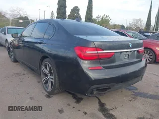 2016 BMW 7 Series 740i with VIN WBA7E2C51GG547537, listed as a IAAI auction lot 41794434 with 149,655 mi miles. Bid and sale history available at carsss.com. Image 3.