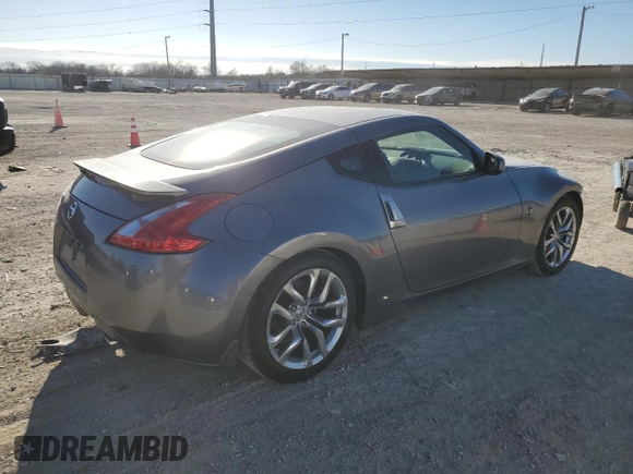 2014 Nissan 370Z Nismo with VIN JN1AZ4EH6EM633797, listed as a Copart auction lot 87879675 with 21,410 mi miles and Salvage Title. Bid and sale history available at DreamBid. Image 3.