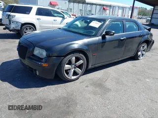 2005 Chrysler 300 with VIN 2C3AA63HX5H649107, listed as a IAAI auction lot 41748562 with 173,803 mi miles. Bid and sale history available at carsss.com. Image 17.