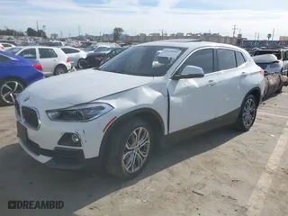 2020 BMW X2 sDrive28i with VIN WBXYH9C01L5P15004, listed as a IAAI auction lot 41128060 with 86,052 mi miles. Bid and sale history available at carsss.com. Image 2.