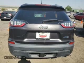 2019 Jeep Cherokee Latitude Plus with VIN 1C4PJLLX4KD248561, listed as a Copart auction lot 57296355 with 123,308 mi miles and Salvage title. Bid and sale history available at DreamBid. Image 6.