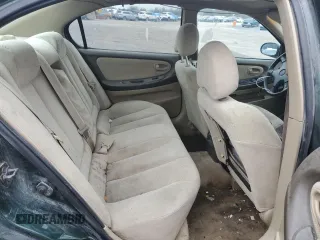 2000 Nissan Maxima GXE z VIN JN1CA31D7YT522165, wystawiony jako Copart lot #47566965 z przebiegiem 336 529 mil mil oraz Czysty tytuł • Clean title. Historia ofert i sprzedaży dostępna na DreamBid. Obrazek 10.