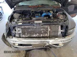 2002 Dodge Ram 2500 with VIN 3B7KF23C82M255391, listed as a Copart auction lot 73115584 with 216,242 mi miles and Salvage Title. Bid and sale history available at carsss.com. Image 11.