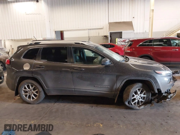2014 Jeep Cherokee Latitude with VIN 1C4PJMCS4EW272815, listed as a IAAI auction lot 41616504 with 97,613 mi miles and . Bid and sale history available at carsss.com. Image 13.