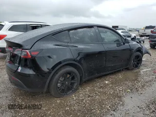 2024 Tesla Model Y z VIN 7SAYGDED7RF018059, wystawiony jako Copart lot #54273785 z przebiegiem 30 080 mil mil oraz Szkoda całkowita • Salvage title. Historia ofert i sprzedaży dostępna na DreamBid. Obrazek 3.