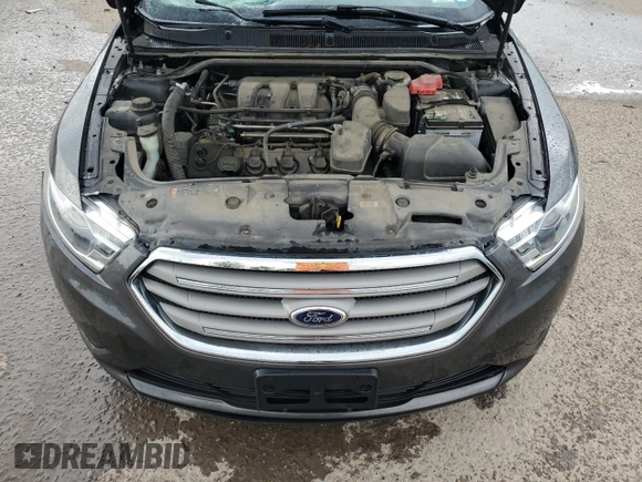 2015 Ford Taurus SEL with VIN 1FAHP2E82FG120607, listed as a Copart auction lot 59853315 with 172,812 mi miles and Salvage title. Bid and sale history available at DreamBid. Image 11.