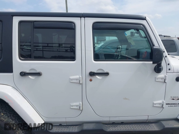 2018 Jeep Wrangler Unlimited Sahara with VIN 1C4HJWEG1JL801934, listed as a IAAI auction lot 42072968 with 112,432 mi miles and . Bid and sale history available at DreamBid. Image 13.