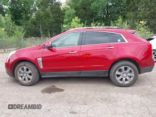2016 Cadillac SRX Premium Collection z VIN 3GYFNDE37GS525186, wystawiony jako IAAI lot #42179497 z przebiegiem 117 200 mil mil oraz . Historia ofert i sprzedaży dostępna na DreamBid. Obrazek 14.