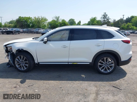 2021 Mazda CX-9 Grand Touring z VIN JM3TCBDY8M0537986, wystawiony jako IAAI lot #42267157 z przebiegiem 25 375 mil mil oraz . Historia ofert i sprzedaży dostępna na DreamBid. Obrazek 15.