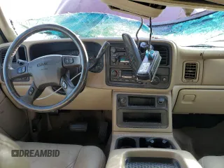 2004 GMC Yukon SLE z VIN 1GKEC13Z04J275904, wystawiony jako Copart lot #73719294 z przebiegiem 138 352 mil mil oraz Nie do naprawy • Non repairable. Historia ofert i sprzedaży dostępna na DreamBid. Obrazek 8.