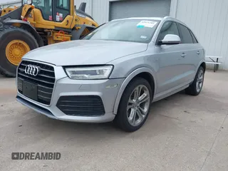 2018 Audi Q3 Premium Plus z VIN WA1JCCFS8JR023281, wystawiony jako IAAI lot #42071289 z przebiegiem 71 335 mil mil oraz . Historia ofert i sprzedaży dostępna na DreamBid. Obrazek 21.