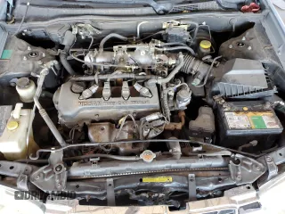 2000 Nissan Sentra XE with VIN 3N1CB51DXYL353188, listed as a Copart auction lot 56490115 with 190,643 mi miles and Salvage title. Bid and sale history available at DreamBid. Image 11.