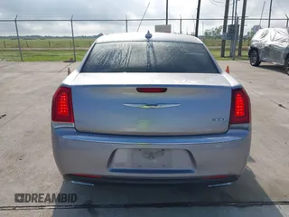 2016 Chrysler 300 Anniversary Edition with VIN 2C3CCAAG9GH211875, listed as a IAAI auction lot 42052083 with 209,251 mi miles and . Bid and sale history available at DreamBid. Image 16.