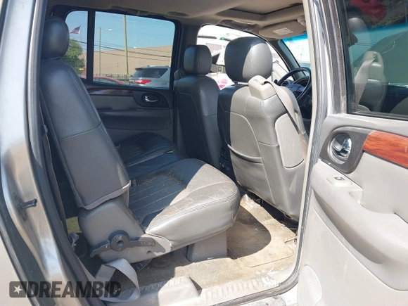 2003 GMC Envoy SLT with VIN 1GKES16S336101568, listed as a IAAI auction lot 40187998 with 185,402 mi miles. Bid and sale history available at carsss.com. Image 8.