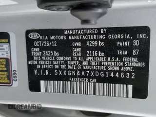 2013 Kia Optima EX z VIN 5XXGN4A7XDG144632, wystawiony jako Copart lot #83599614 z przebiegiem 97 316 mil mil oraz Szkoda całkowita • Salvage title. Historia ofert i sprzedaży dostępna na DreamBid. Obrazek 12.