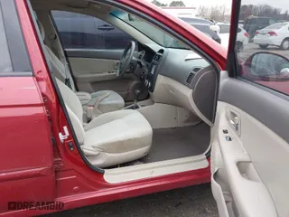 2008 Kia Spectra EX with VIN KNAFE121285543210, listed as a IAAI auction lot 41744326 with 212,743 mi miles. Bid and sale history available at carsss.com. Image 5.