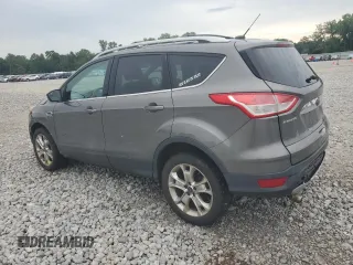 2013 Ford Escape SEL z VIN 1FMCU9HX7DUC11052, wystawiony jako Copart lot #62377515 z przebiegiem 225 704 mil mil oraz Szkoda całkowita • Salvage title. Historia ofert i sprzedaży dostępna na DreamBid. Obrazek 2.