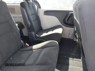 2016 Dodge Grand Caravan SXT with VIN 2C4RDGCG5GR275876, listed as a IAAI auction lot 42121344 with 140,652 mi miles. Bid and sale history available at carsss.com. Image 8.