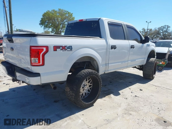 2016 Ford F-150 XLT with VIN 1FTEW1EF7GFB83167, listed as a IAAI auction lot 41676945 with 173,859 mi miles. Bid and sale history available at carsss.com. Image 4.