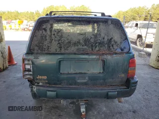 1998 Jeep Grand Cherokee Limited with VIN 1J4GZ78Y8WC261353, listed as a Copart auction lot 76605944 with 156,883 mi miles and Salvage Title. Bid and sale history available at carsss.com. Image 6.