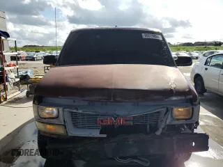 2004 GMC Safari Cargo with VIN 1GTDM19XX4B504173, listed as a Copart auction lot 86519664 with 129,025 mi miles and Salvage Title. Bid and sale history available at carsss.com. Image 5.