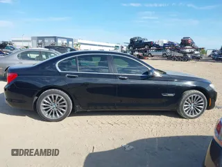 2012 BMW 7 Series 740i with VIN WBAKA4C51CC613636, listed as a IAAI auction lot 41908801 with 127,725 mi miles and . Bid and sale history available at carsss.com. Image 14.