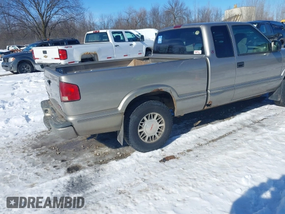 1999 GMC Sonoma SLS with VIN 1GTDT19X9X8531949, listed as a IAAI auction lot 41608606 with 127,664 mi miles. Bid and sale history available at carsss.com. Image 4.