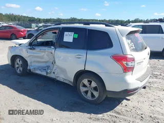 2014 Subaru Forester 2.5i Touring with VIN JF2SJAMC6EH413261, listed as a IAAI auction lot 40672035 with 1 mi miles. Bid and sale history available at carsss.com. Image 3.