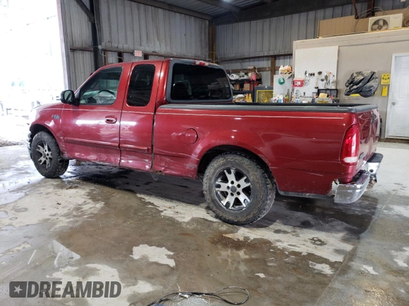 2000 Ford F-150 XL with VIN 1FTZX1720YKB22051, listed as a Copart auction lot 88255005 with 243,759 mi miles and Salvage Title. Bid and sale history available at carsss.com. Image 2.
