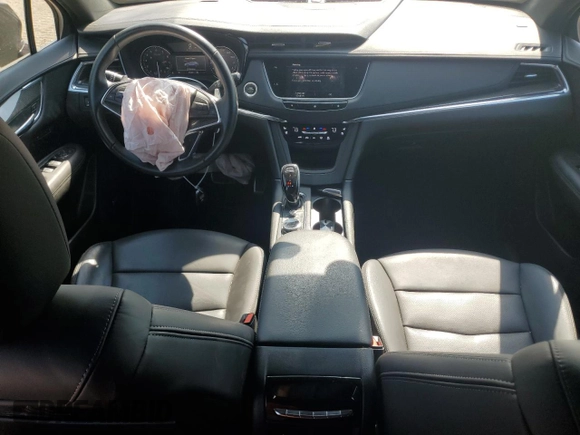 2021 Cadillac XT5 AWD Sport with VIN 1GYKNGRS8MZ152739, listed as a Copart auction lot 60675705 with 51,669 mi miles and Salvage title. Bid and sale history available at DreamBid. Image 8.