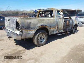2002 Ford F-150 XL with VIN 1FTRX17L02NB15843, listed as a IAAI auction lot 41836759 with 1 mi miles. Bid and sale history available at carsss.com. Image 4.