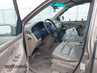 2004 Honda Odyssey EX-L with VIN 5FNRL18744B034830, listed as a IAAI auction lot 42052008 with 182,178 mi miles and . Bid and sale history available at DreamBid. Image 5.