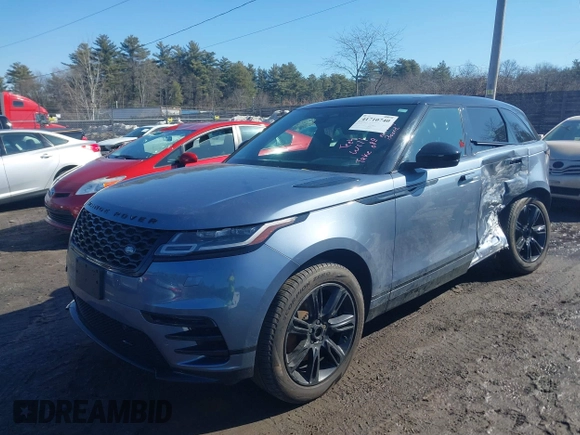 2023 Land Rover Range Rover Velar R-Dynamic S with VIN SALYT2EX2PA356975, listed as a IAAI auction lot 41710740 with 21,386 mi miles and . Bid and sale history available at DreamBid. Image 2.