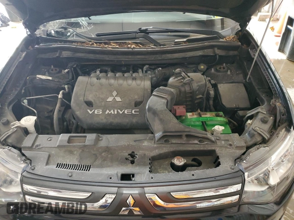 2014 Mitsubishi Outlander GT z VIN JA4JZ4AX2EZ013911, wystawiony jako Copart lot #60603715 z przebiegiem 78 547 mil mil oraz Szkoda całkowita • Salvage title. Historia ofert i sprzedaży dostępna na DreamBid. Obrazek 12.