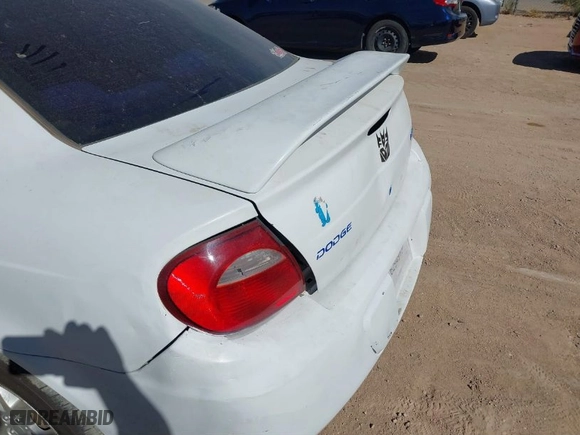 2003 Dodge Neon SE with VIN 1B3ES26C33D158585, listed as a IAAI auction lot 41641809 with NaN miles. Bid and sale history available at carsss.com. Image 12.