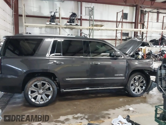 2016 GMC Yukon Denali with VIN 1GKS2CKJ8GR215954, listed as a IAAI auction lot 41362739 with 143,982 mi miles. Bid and sale history available at carsss.com. Image 12.