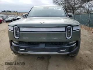 2022 Rivian R1S Launch Edition z VIN 7PDSGABL4NN000393, wystawiony jako Copart lot #44218005 z przebiegiem 26 598 mil mil oraz Szkoda całkowita • Salvage title. Historia ofert i sprzedaży dostępna na DreamBid. Obrazek 5.