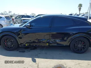 2023 Ford Mustang Mach-E GT z VIN 3FMTK4SX5PMA06095, wystawiony jako IAAI lot #42203596 z przebiegiem 27 664 mil mil oraz . Historia ofert i sprzedaży dostępna na DreamBid. Obrazek 14.