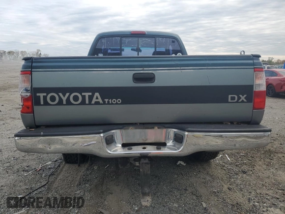 1995 Toyota T100 z VIN JT4VD22E9S0004095, wystawiony jako Copart lot #52683765 z przebiegiem 564 413 mil mil oraz Szkoda całkowita • Salvage title. Historia ofert i sprzedaży dostępna na DreamBid. Obrazek 6.