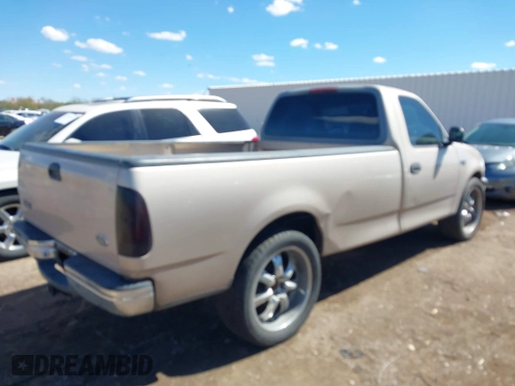 1998 Ford F-150 with VIN 1FTZF1726WKB44118, listed as a IAAI auction lot 41786536 with 155,032 mi miles and . Bid and sale history available at DreamBid. Image 4.