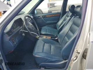 1990 Mercedes-Benz 300 with VIN WDBEA30D7LB246817, listed as a Copart auction lot 71825934 with 120,489 mi miles and Salvage Title. Bid and sale history available at carsss.com. Image 7.