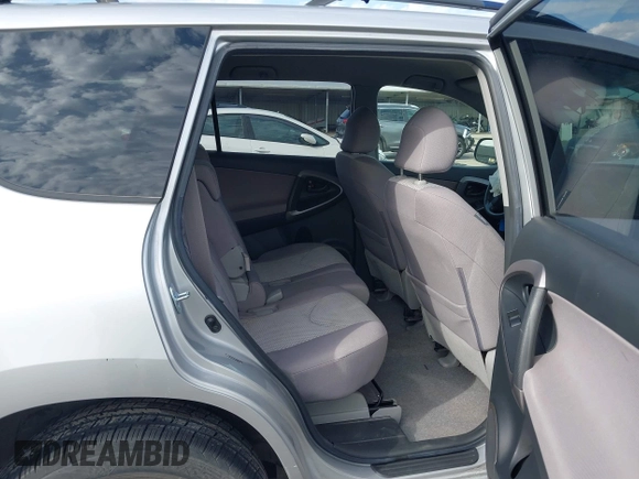 2007 Toyota RAV4 with VIN JTMZK33V876006923, listed as a IAAI auction lot 41406204 with 121,425 mi miles. Bid and sale history available at carsss.com. Image 8.