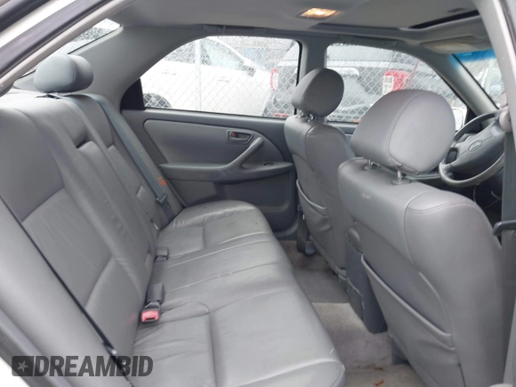 1999 Toyota Camry LE z VIN 4T1BF28K4XU931902, wystawiony jako IAAI lot #41707824 z przebiegiem 171 224 mil mil oraz . Historia ofert i sprzedaży dostępna na DreamBid. Obrazek 8.