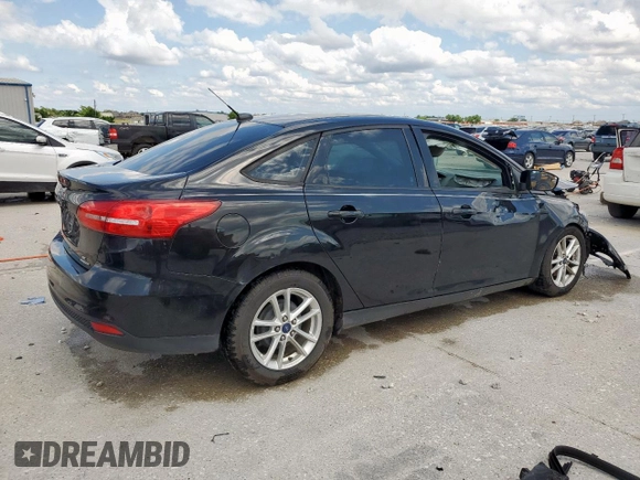 2015 Ford Focus SE with VIN 1FADP3F23FL242768, listed as a Copart auction lot 58068865 with 172,163 mi miles and Salvage title. Bid and sale history available at DreamBid. Image 3.